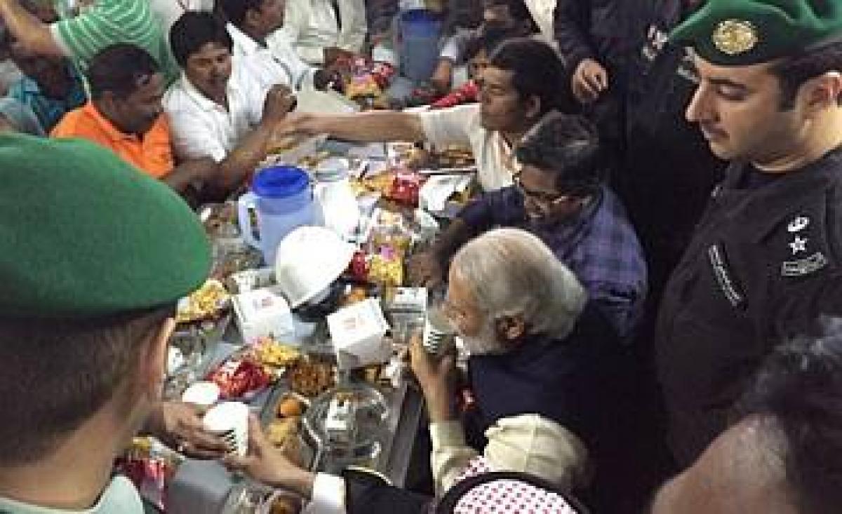 When Modi shared a meal with Indian blue collar workers in Saudi